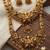 traditional gold-plated temple jewellery set with necklace and jhumkas