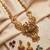 traditional gold-plated temple necklace set with earrings