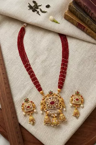 elegant red pearl and gold kundan necklace set