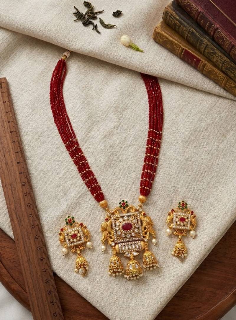 elegant red pearl and gold kundan necklace set