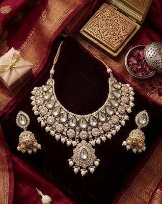 gold-plated kundan and pearl choker set with earrings 1