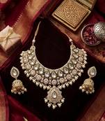 gold-plated kundan and pearl choker set with earrings