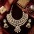 gold-plated kundan and pearl choker set with earrings