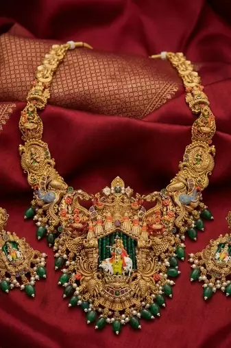 exquisite krishna temple gold-plated bridal jewellery set