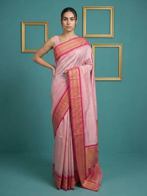 baby pink soft silk blend with gold zari motifs zari woven saree  1