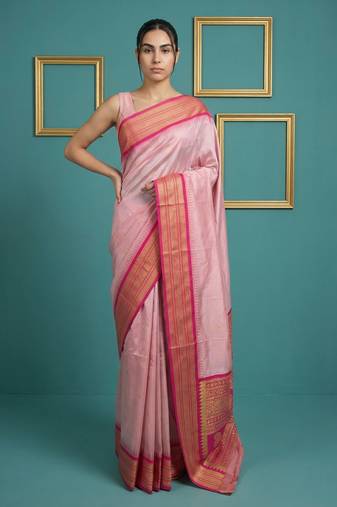 baby pink soft silk blend with gold zari motifs zari woven saree 