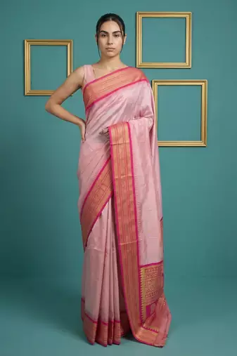 baby pink soft silk blend with gold zari motifs zari woven saree 