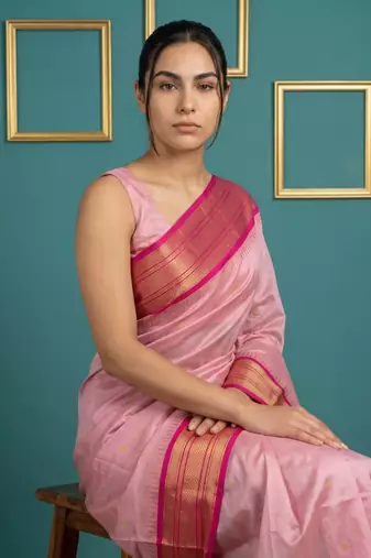 baby pink soft silk blend with gold zari motifs zari woven saree 