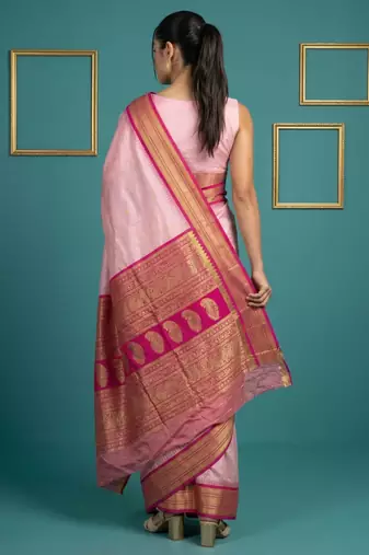 baby pink soft silk blend with gold zari motifs zari woven saree 