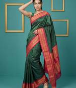 bottel green soft silk blend with gold zari motifs zari woven saree 