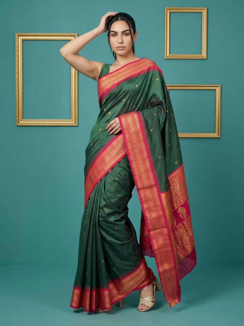 bottel green soft silk blend with gold zari motifs zari woven saree 