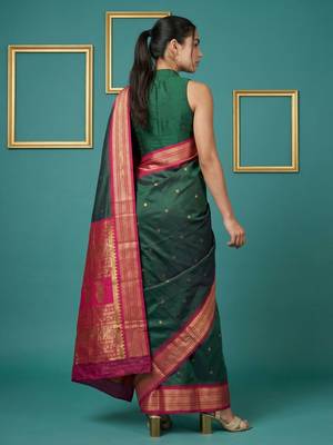bottel green soft silk blend with gold zari motifs zari woven saree  2
