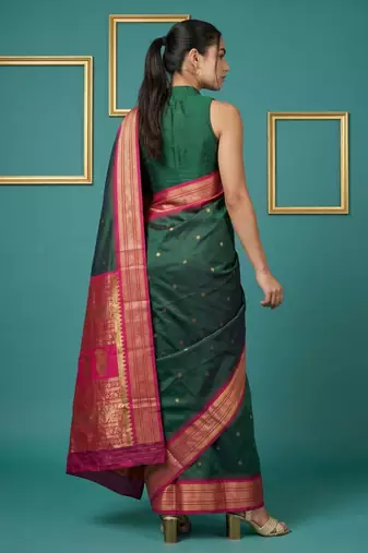 bottel green soft silk blend with gold zari motifs zari woven saree 