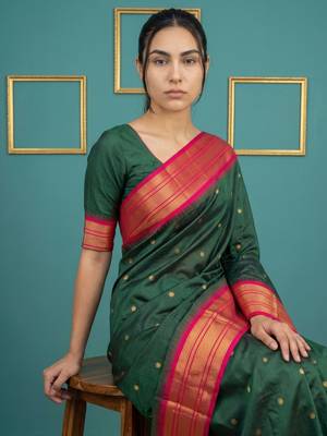 bottel green soft silk blend with gold zari motifs zari woven saree  4