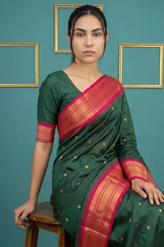 bottel green soft silk blend with gold zari motifs zari woven saree 