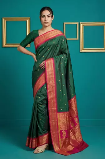 bottel green soft silk blend with gold zari motifs zari woven saree 