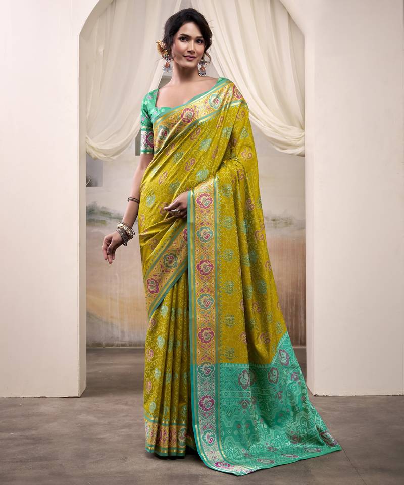  LIGHT YELLOW patola silk blend saree with print & rich pallu