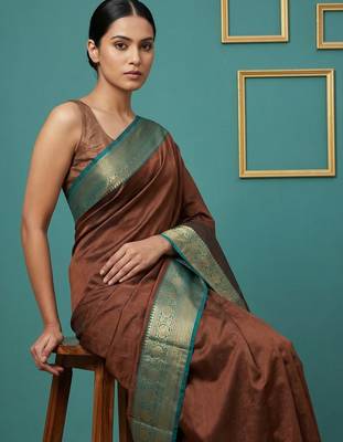 brown soft silk blend with gold zari motifs zari woven saree  3