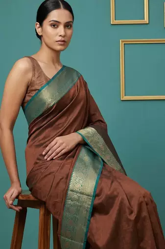brown soft silk blend with gold zari motifs zari woven saree 