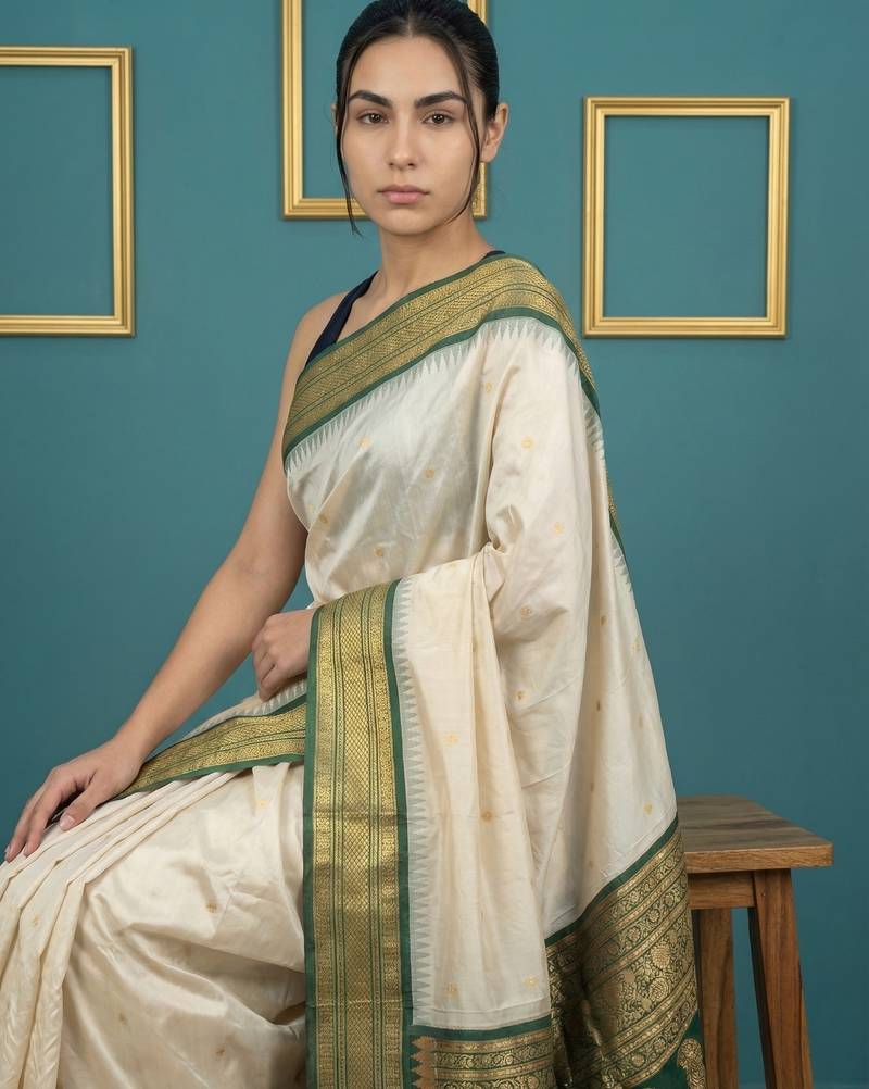 cream soft silk blend with gold zari motifs zari woven saree 