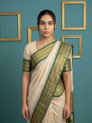 cream soft silk blend with gold zari motifs zari woven saree  5