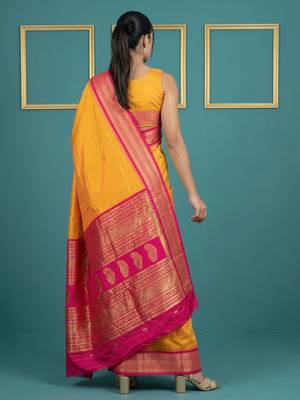 orange soft silk blend with gold zari motifs zari woven saree  3