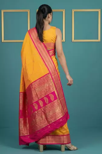 orange soft silk blend with gold zari motifs zari woven saree 