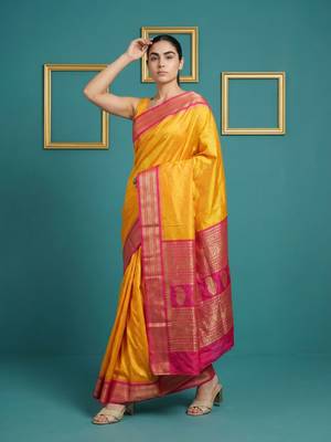 orange soft silk blend with gold zari motifs zari woven saree  4