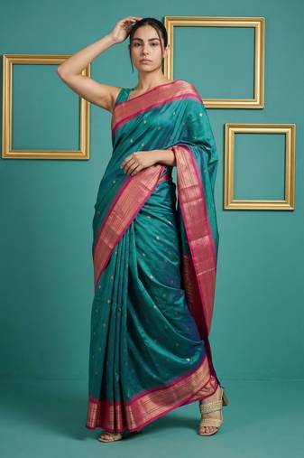 teal green soft silk blend with gold zari motifs zari woven saree 