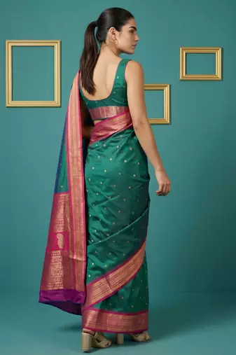 teal green soft silk blend with gold zari motifs zari woven saree 