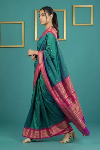 teal green soft silk blend with gold zari motifs zari woven saree 