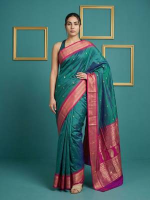 teal green soft silk blend with gold zari motifs zari woven saree  4