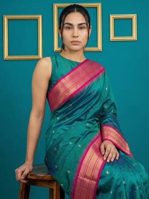 teal green soft silk blend with gold zari motifs zari woven saree  5