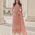 Peach net embroidered sequin salwar suit