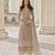 Cream net embroidered sequin salwar suit