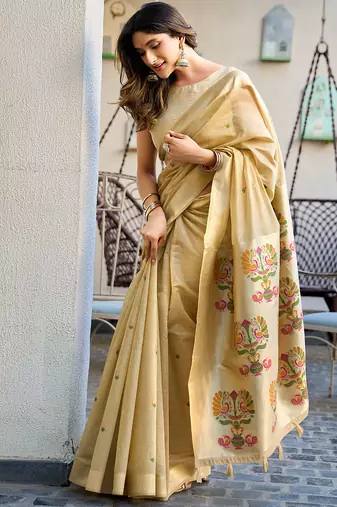 Cream cotton jacquard woven with zari border & tassels saree with blouse