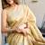 Cream cotton jacquard woven with zari border & tassels saree with blouse