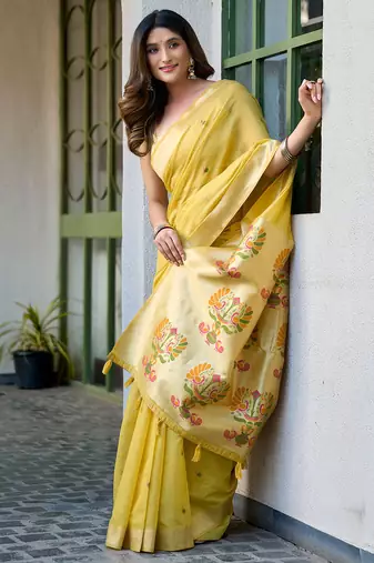 Yellow cotton jacquard woven with zari border & tassels saree with blouse