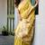 Yellow cotton jacquard woven with zari border & tassels saree with blouse