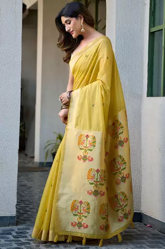 Yellow cotton jacquard woven with zari border & tassels saree with blouse