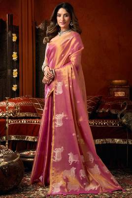 Pink heavy tissue allover cow woven butta with tassels saree with blouse 2