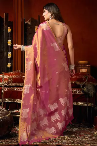 Pink heavy tissue allover cow woven butta with tassels saree with blouse