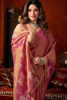 Pink heavy tissue allover cow woven butta with tassels saree with blouse 5