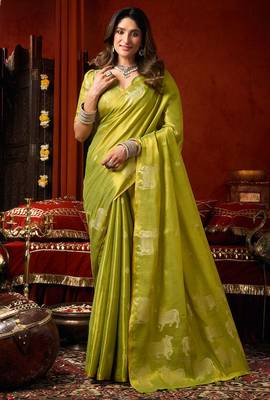 Parrot green heavy tissue allover cow woven butta with tassels saree with blouse 1