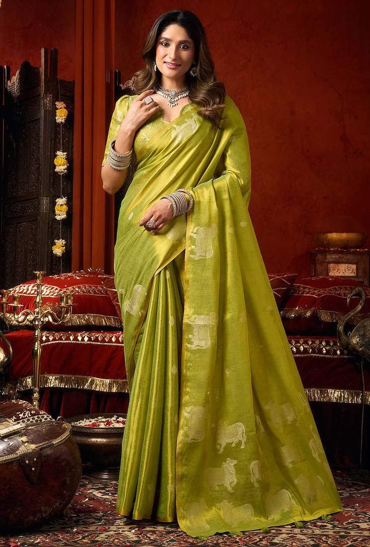 Parrot green heavy tissue allover cow woven butta with tassels saree with blouse