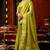 Parrot green heavy tissue allover cow woven butta with tassels saree with blouse