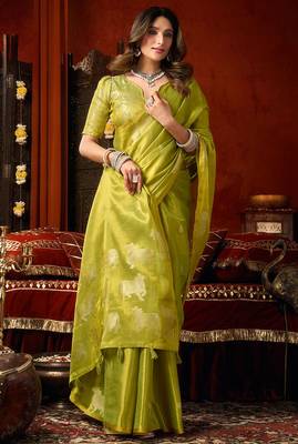 Parrot green heavy tissue allover cow woven butta with tassels saree with blouse 3