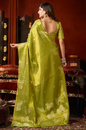 Parrot green heavy tissue allover cow woven butta with tassels saree with blouse