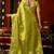 Parrot green heavy tissue allover cow woven butta with tassels saree with blouse