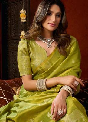 Parrot green heavy tissue allover cow woven butta with tassels saree with blouse 5